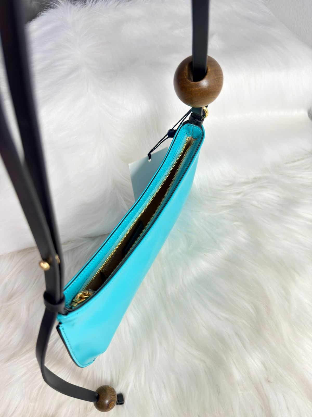 JACQUEMUS
Le Bisou Perle Zip Shoulder Bag in Spazzolato Leather