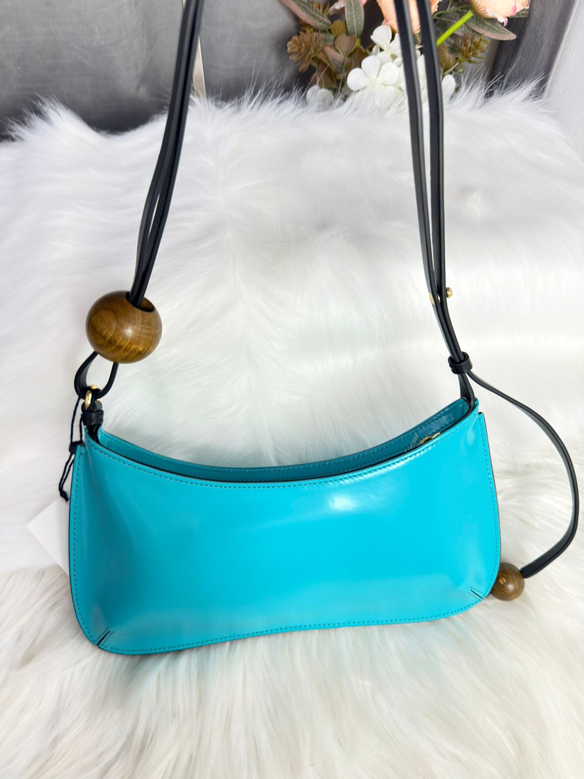 JACQUEMUS
Le Bisou Perle Zip Shoulder Bag in Spazzolato Leather